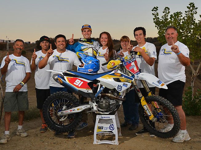 Argubright celebrates with his crew and family after earning the 2014 AMA West Hare Scrambles Championship. It was his first career AMA title. PHOTO BY MARK KARIYA.