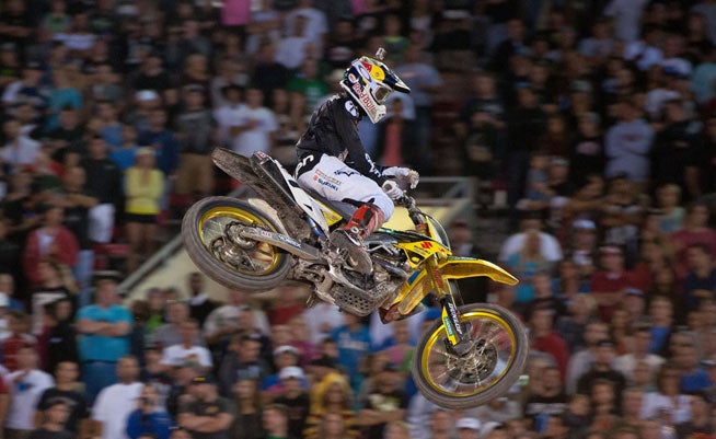 James Stewart's first time contesting the Monster Energy Cup supercross netted the Yoshimura Suzuki rider a $100,00 payday. Stewart won two of the three 10 laps motos to claim the Monster Cup in a wild night of racing in Las Vegas. PHOTO BY STEVE COX