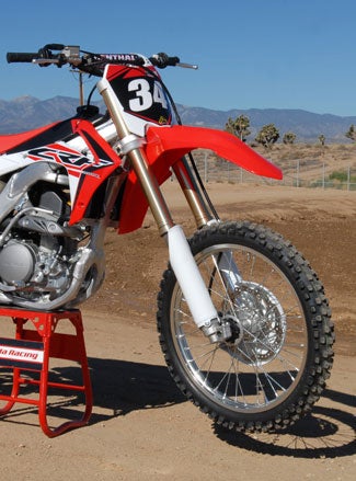 The CRF250R's new Showa 49mm SFF-Air fork offers more adjustability up front than ever. Not only that, but its on-track performance began to make believers out of some of us who are skeptical of the benefit of air springs.