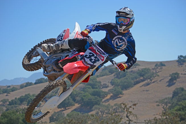 The Honda CRF450R is flying high in 2015 with a host of cool changes that make it a much better package than the 2014 model. A new KYB PSF air fork and an Engine Mode Select feature are just two of the big changes that make the CRF450R better. 