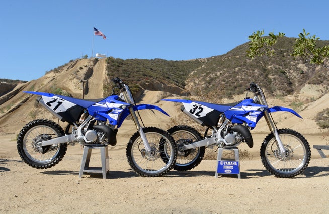 Yamaha's YZ250 (left) and YZ125 (right) are back and better than ever in 2015. A styling makeover and fresh suspension components are keeping the Blu Cru's two-strokes viable in a four-stroke-dominated dirtbike world. 
