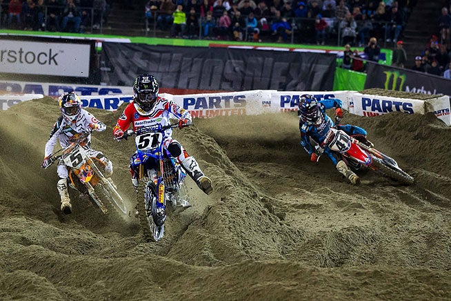 Canard (41) charged through the pack after a mediocre start, taking advantage of close jockeying for position, such as this battle between Ryan Dungey (5) and Justin Barcia (51).