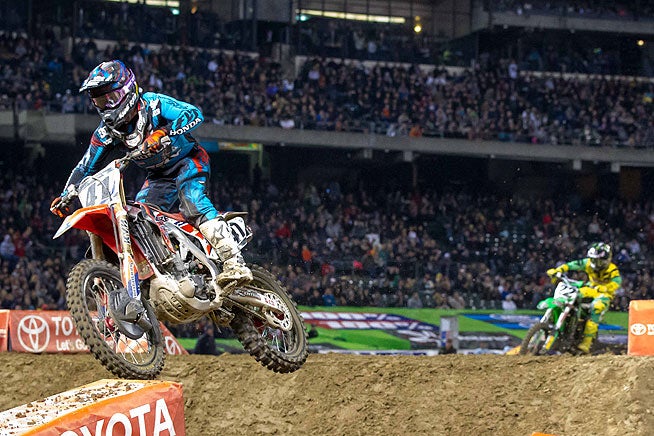 Trey Canard (41) passed Chad Reed (22) at the Oakland Supercross to earn his first Monster Energy AMA Supercross win since 2011. ALL PHOTOS BY RICH SHEPHERD.