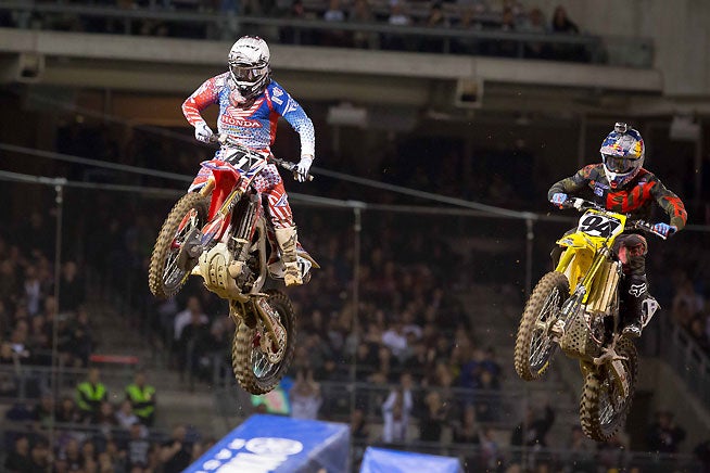 Trey Canard (41) passed Ken Roczen (94) early in the 450cc main event and went on to win the first Monster Energy AMA Supercross to be held at Petco Park in San Diego, California. PHOTOS BY RICH SHEPHERD.