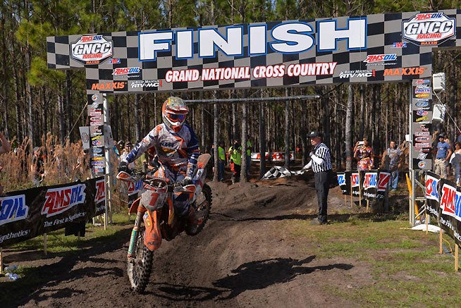 FMF/KTM's Kailub Russel celebrated his first win as the defending AMSOIL GNCC Series Champion at the series opener in Palatka, Florida, Sunday. PHOTOS B Y KEN HILL.