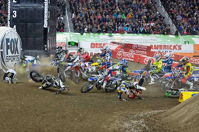 The start of the crash at the start of the 250cc main took out several of the potential podium finishers. Webb (not shown) was one of them, but he was able to remount quickly.
