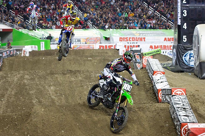 Veteran supercross rider Josh Hansen (100) held the lead for much of the race before Webb (17) caught and passed him. Hansen would pull off the track with bike problems shortly thereafter. problems.