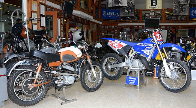 Yamaha took the wraps off the YZ250X at Tom White's Early Years of MX museum in Southern California, which houses about 180 pre-1972 vintage motorcycles, all of them in pristine condition. The machine on the left is a 1961 Yamaha YDS2C "with scrambler kit", Yamaha's first true off-road racing motorcycle available for sale.