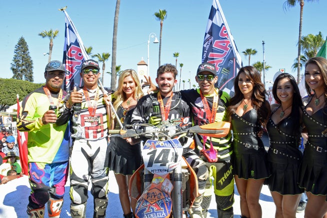 The all-Mexican Adelita Racing KTM team celebrates its runner-up overall finish on the podium in Ensenada.