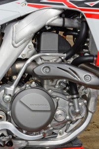 The CRF's 449cc Unicam SOHC Single delivers excellent throttle response, user-friendly torque and a seemless power curve. It also boasts Honda's Engine Mode Select function, which allows the rider to tailor the power curve at the press of a button.