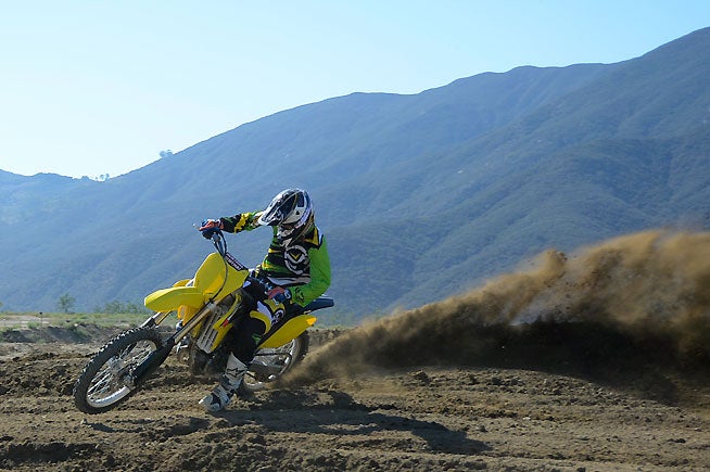 Keeping the throttle pinned and conserving momentum is the key to fast lap times on the RM-Z 250.