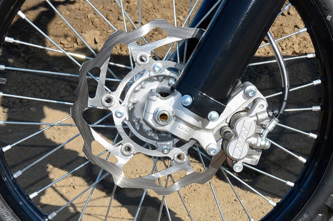 Kawasaki designed its 270mm front brake rotor in conjunction with Braking. The rotor and Nissin two-piston caliper deliver strong stopping power without being grabby.