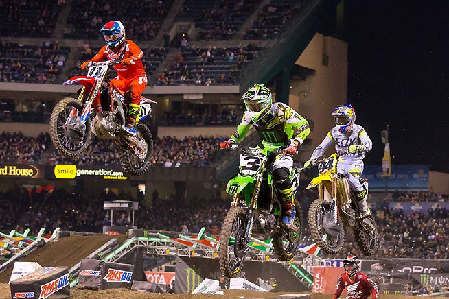 Eli Tomac (3), Ken Roczen (94) and Trey Canard (41), battled in the 450cc main event, finishing fourth, fifth and seventh respectively. PHOTO BY RICH SHEPHERD.