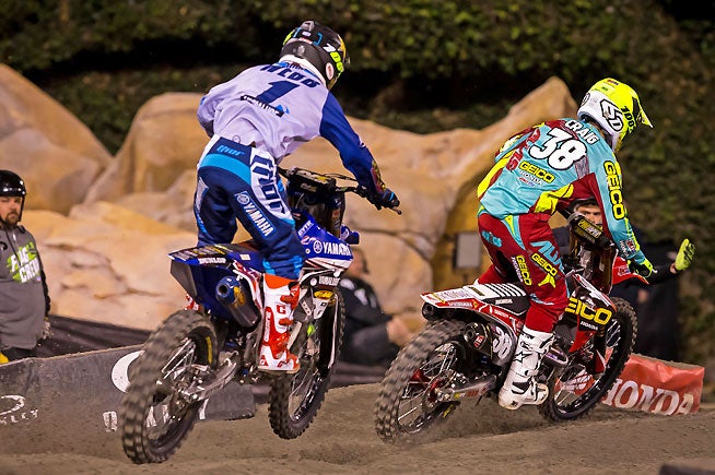 Cooper Webb (1) exchanged the lead 13 times with Christian Craig (38) in just a few laps in the Anaheim II 250SX West main event, but Webb ultimately made a pass that stuck and went on to remain undefeated through the first three rounds of the series. PHOTO BY RICH SHEPHERD.