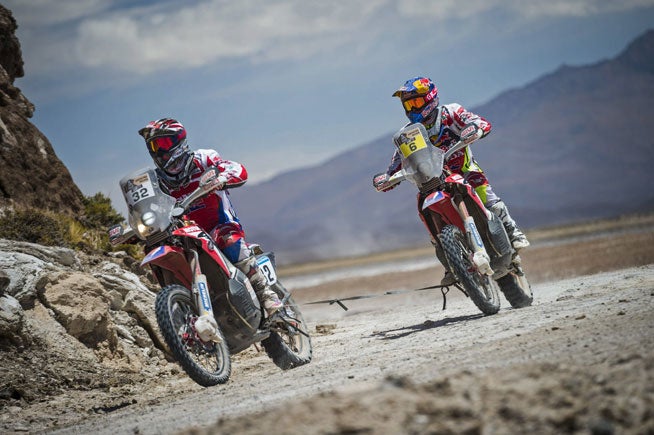 In a scene similar to last year's Dakar Rally, Joan Barreda (6) suffered some sort of failure and wound up on the end of a tow rope. Barreda is now nearly 5 hours off the lead pace and has little hope of winning the event. PHOTO COURTESY OF RED BULL CONTENT POOL.