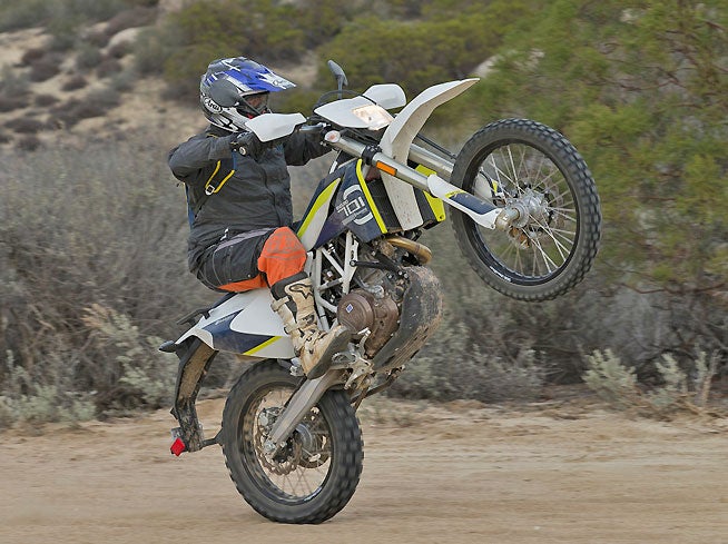 Husqvarna's new 701 Enduro cranks out so much low-end torque that lofting the front wheel is easy. The 701 is an extremely versatile and fun dual-sport machine.