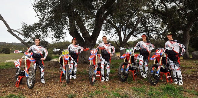 Off-road racing legend Johnny Campbell (center) has extended his agreement with American Honda and will continue to run its factory off-road racing program in America. JCR/Honda has also expanded to include four riders, with Ricky Brabec (2), Benny Breck (824) and Trevor Bollinger (10) joining  Chris Bach (4) on the team. 