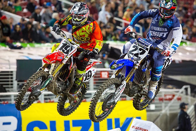 Chad Reed (22) had another strong run in Santa Clara, finishing fourth in the main event. Justin Bogle (19) ultimately finished sixth, behind Trey Canard. PHOTO BY RICH SHEPHERD.