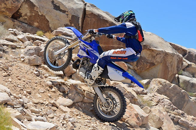 The YZ250X's engine and wide-ratio five-speed gearbox are equally at home in rocky technical sections like this one or in high-speed terrain. There's always a gear for the task at hand, and tractable power is always plentiful.