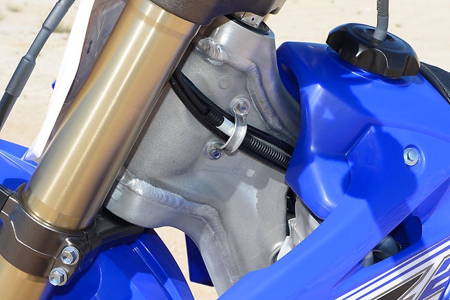 As you can see here, the YZ250X also uses Yamaha's backbone-style aluminum frame. The motocross-derived chassis works well in almost all off-road situations but gets just a tad squirmy at top speed.