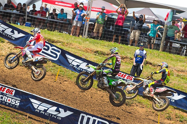 Cole Seely (14), Roczen (94) and Eli Tomac (3) battled in the first moto before Roczen took the lead and went on to win. Tomac finished second. Seely finished third en route to a fourth-place overall finish for the day. PHOTO BY RICH SHEPHERD.