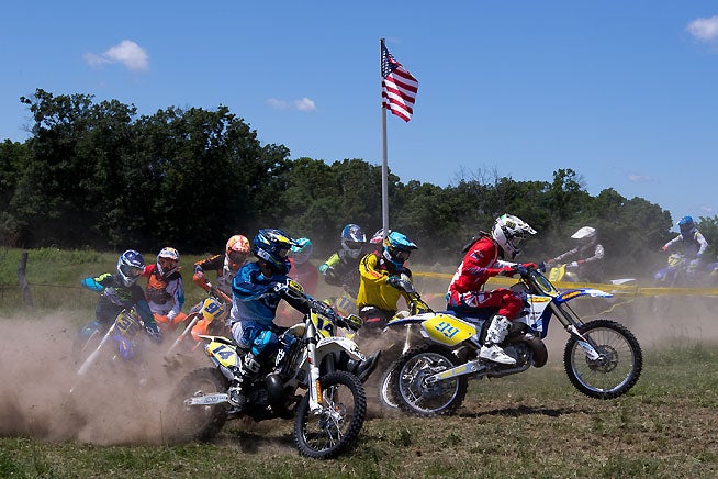Cody Barnes (99) showed the Pro 2 class that he is a force to be reckoned with in the OMA Nationals. Barnes took both holeshots and won both motos to stand atop the Moonshine XC podium. PHOTO BY JOHN GASSO.