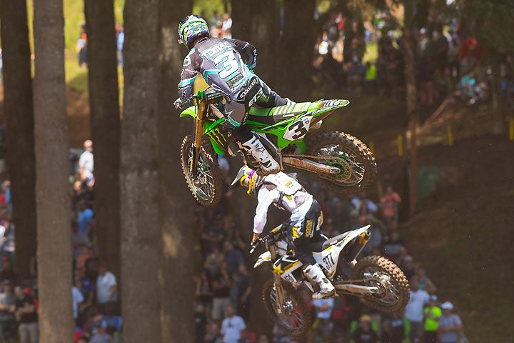 Tomac (3) and Christophe Pourcel (377) engaged in an epic battle for second place in Moto 1 before Pourcel smacked the ground hard and failed to finish the race. Pourcel was back on track for Moto 2. PHOTO BY RICH SHEPHERD.