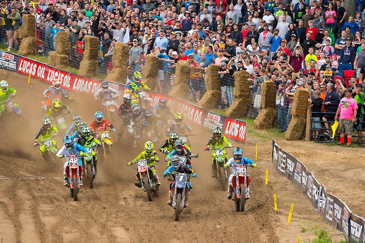 Jeremy Martin (1) pulled the holeshot in the first 250cc moto to lead the field in front of the largest crowd in Southwick National history. Martin went on to win the moto but dropped to fourth in Moto 2, finishing second overall. PHOTO BY RICH SHEPHERD.