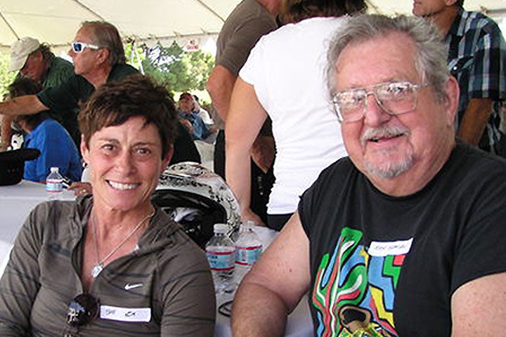 Shown here with female motocross racing legend Sue Fish (left), iconic dirtbike journalist Rick Sieman (right) will be a regular contributor to DirtBikes.com.