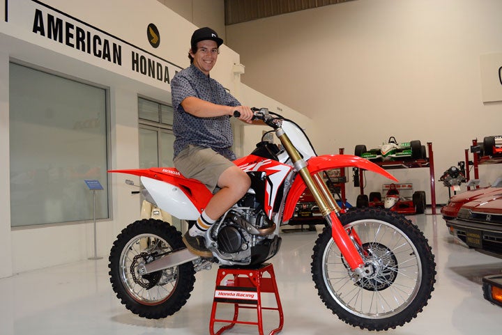 DirtBikes.com contributor and test rider Nic Garvin takes a seat aboard the Honda CRF450RX. We had to pry him off the thing...