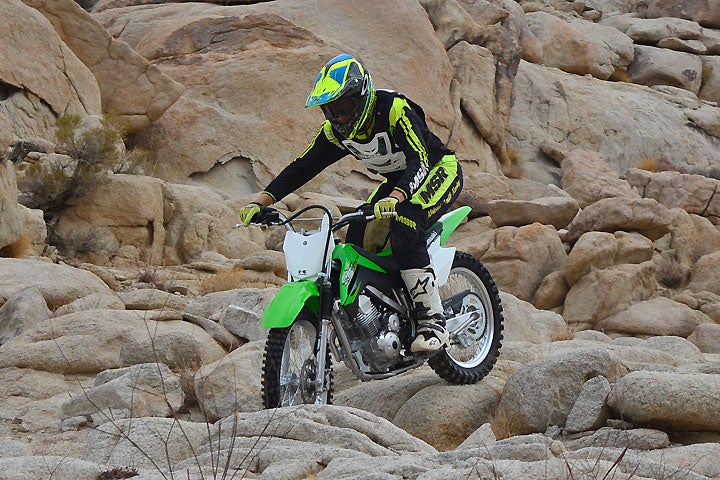 Suspension at both ends is plush, although the KLX140G's nonadjustable 33mm Showa fork is too soft for aggressive riding.