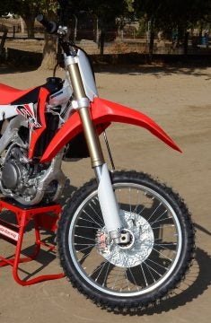 The CRF250R's 49mm Showa SFF-TAC ranks right at the top our fave list when it comes to air forks. It's easy to dial-in, and it delivers 12.2 inches of plush yet controlled travel.