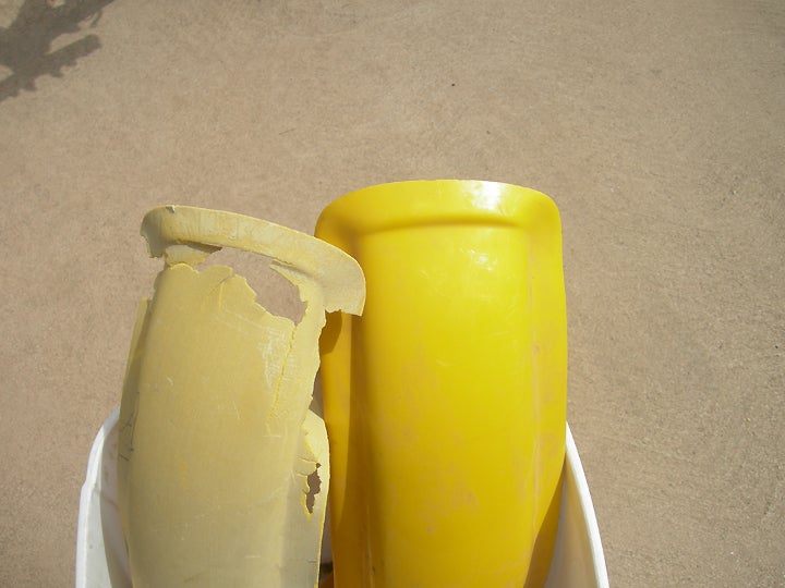 We compared the fenders to what we had and the choice was obvious. A light coat of Sun Yellow made them look like new.