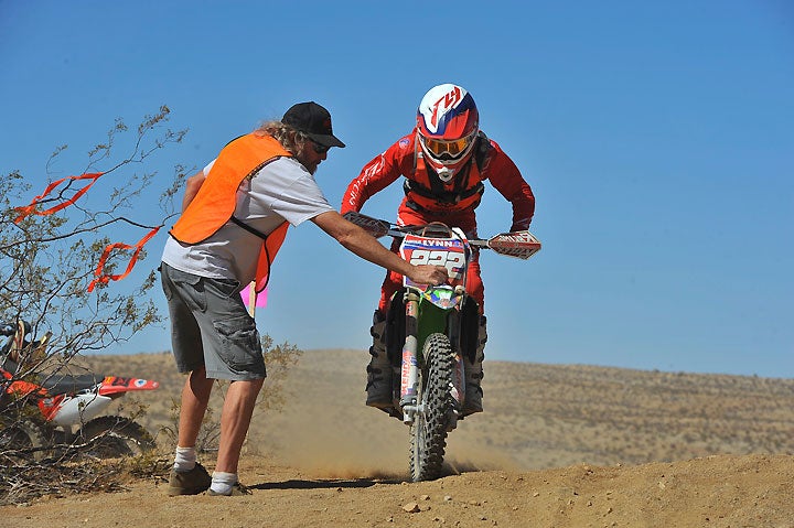 yler Lynn skids to a stop at a check to get his fender card marked en route to dominating the Big Wheel (150cc, 12-15 years old) class for the fifth time to unofficially wrap up the class championship. The next day he finished fourth in the FMF Pro 250 division on his YZ250, the class he’ll race full-time next season. PHOTO BY MARK KARIYA.