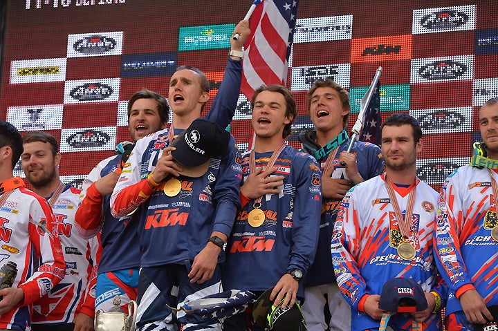 For the first time in ISDE history, the Star Spangled Banner played for the FIM World Trophy team winner, signifying Team USA’s long-awaited win in enduro’s most prestigious prize. From left, Thad Duvall, Taylor Robert, Kailub Russell and Layne Michael belt it out. PHOTO BY MARK KARIYA.