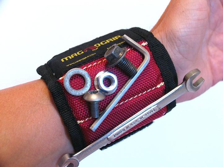 Magnogrip's magnetic wristband is strong enough to hold nuts, bolts and even wrenches to help keep your dirtbike maintenance chores organized.