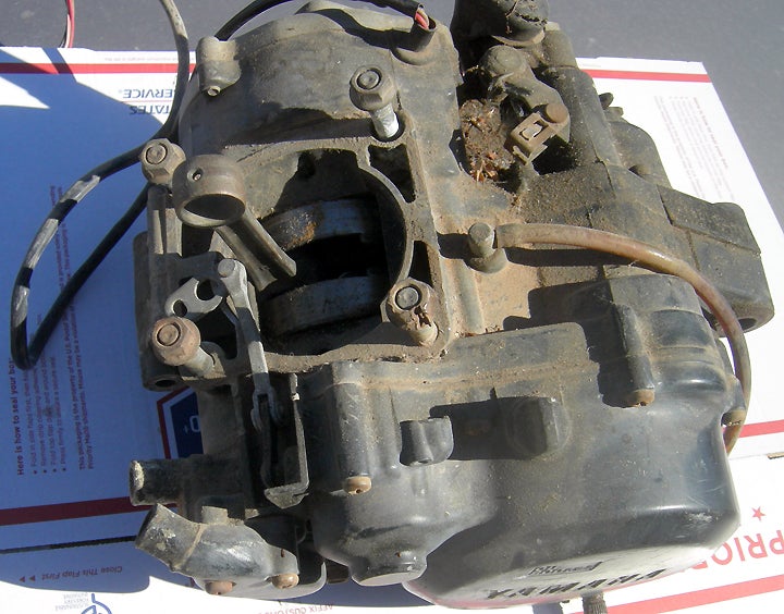 Our YZ125 engine is in much better condition than it looks. PHOTO BY RICK SIEMAN.