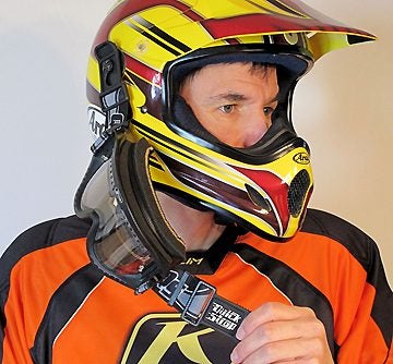 Roko's Quick Strap is preferred by the author because it makes for easy goggle removal and allows the goggle to hang on the helmet mount pins that come with the strap .