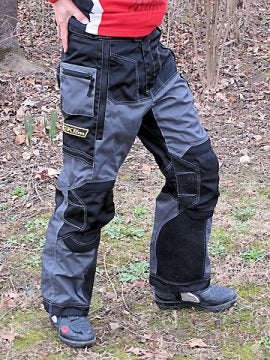 Most competition-style off-road pants are worn inside the boot, while some enduro, dual-sport and adventure--style pants, such as the pants shown here, are worn over the boot