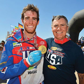 Gary Jones (right) with son and ISDE gold medalist Justin Jones (left). PHOTO BY MARK KARIYA.