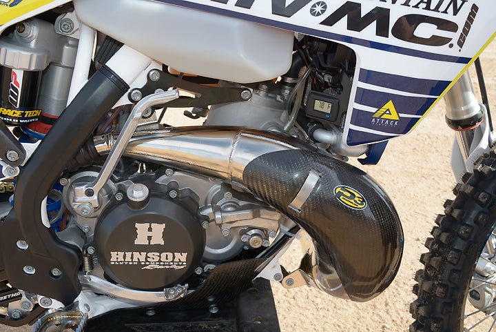 To get more punch out of the TX 300 engine, Clark milled the head. 016", installed a Vertex piston, an FMF Racing exhaust system and modified the Mikuni TMX 38 carb.