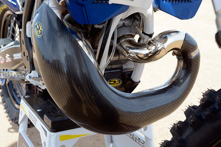 This Husqvarna TX 300 features a number of guards to protect against damage in the desert. A P3 Carbon pipe guard fortifies the FMF Racing Gnarly pipe. The full-coverage skid plate is also a P3 Carbon item.