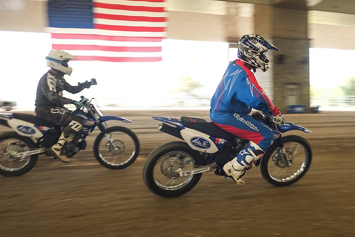 It's cool to have seven-time AMA Grand National Flat Track Champion Chris Carr shoot video of you as you're working on your sliding technique. It kinda sucks when you realize that Carr is going just as fast you are while holding a GoPro camera to film you.