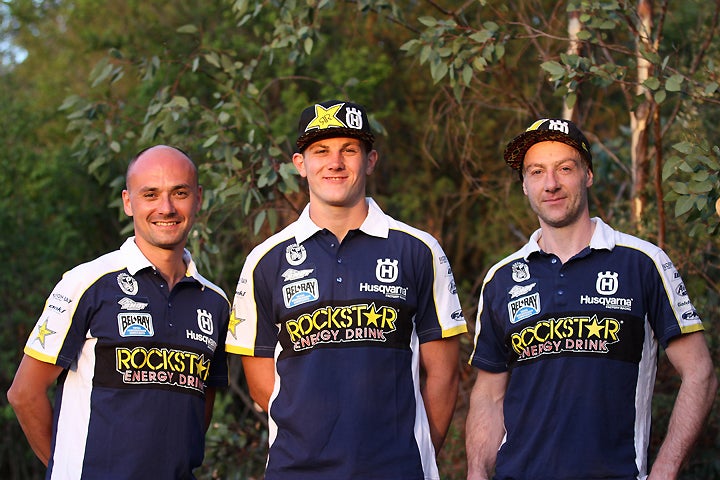 Rockstar Energy Husqvarna Extreme Enduro Team Manager Andreas Hölzl (left) poses with 2017 team riders Billy Bolt (center) and Graham Jarvis (right).