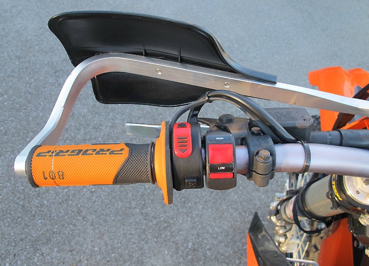 Other than the noticeable wire extending from underneath the grips on this KTM, you wouldn't know that the machine now affords the rider an extra measure of warmth thanks to the simple installation of grip heaters.