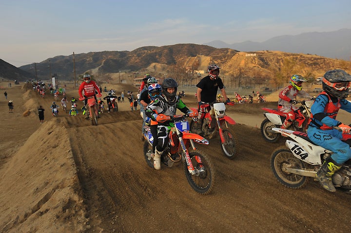 This is just a fraction of the number of people who took to the Glen Helen MX track for the traditional tribute lap to Kurt Caselli at the end of the Fourth Annual Kurt Caselli Memorial Ride Day at Glen Helen Raceway in Southern California on December 10. PHOTO BY MARK KARIYA.
