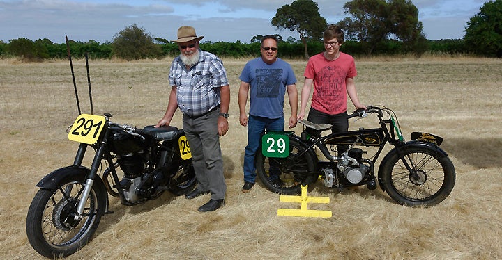 Three generations: Doug Davis's son Bruce and grandson Joshua will race his 1948 Machless 500 and 1925 Velocette 250 at Sellicks Beach. PHOTO BY PETER HENNEKAM.