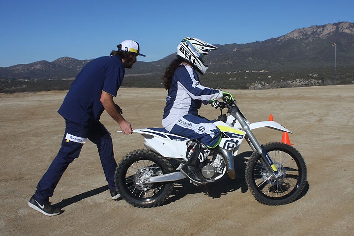 It's a good idea to walk behind or beside the beginner, calmly giving them instructions as they begin their first ride.