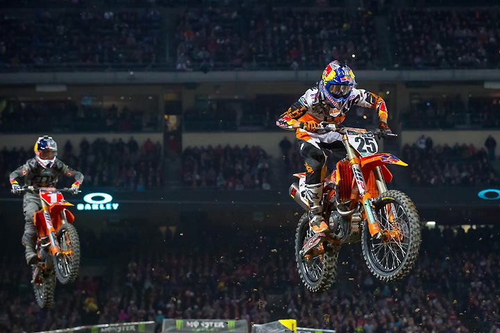 Marvin Musquin (25) ran second early in the Anaheim main event but was eventually passed by Dungey (1). Still, the Frenchman landed on the podium in third place. PHOTO BY RAS PHOTO.