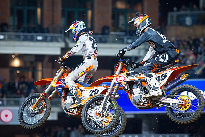 Marvin Musquin (25), shown here racing Davi Millsaps (18) earlier in the night, finished third in the main event. Millsaps finished eighth. PHOTO BY RAS PHOTO.